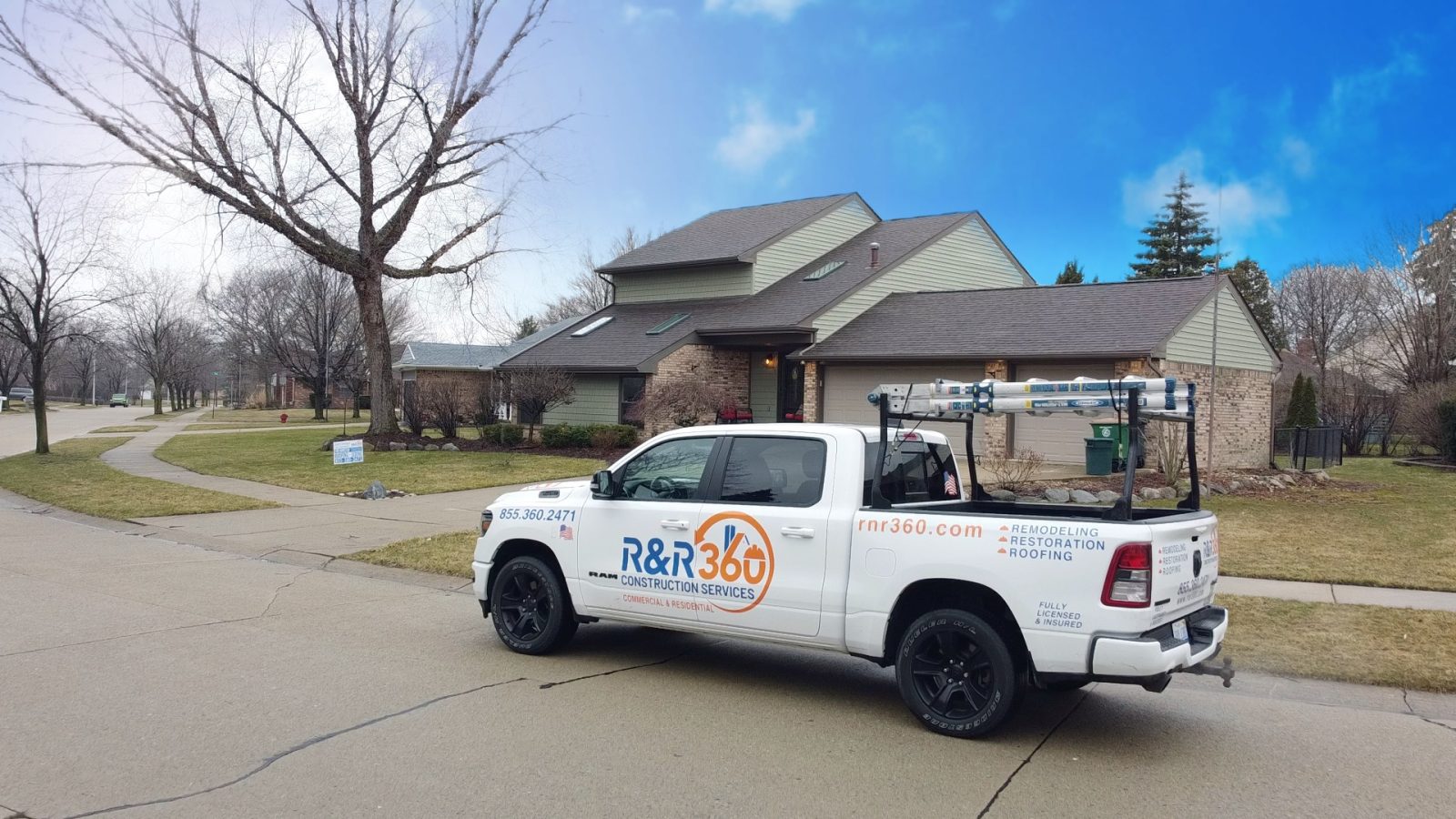 R&R 360 truck outside a roofing and siding job